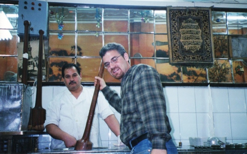 Pounding ice cream at the famous Bakdash in Damascus, Syria