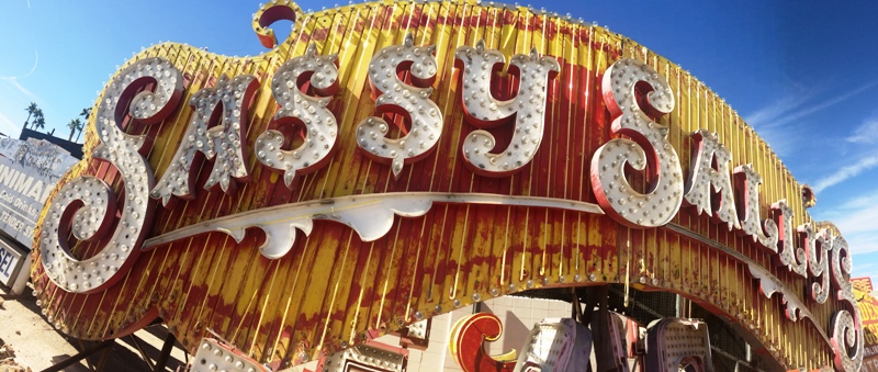 The ketchup and mustard colors of the Sassy Sally's sign.