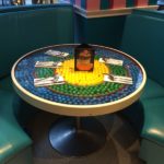 Tables in the cafe are filled with gumballs.