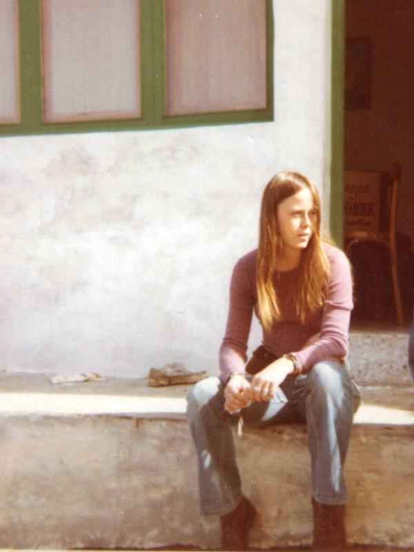 Jenny sitting on the step in La Caleta